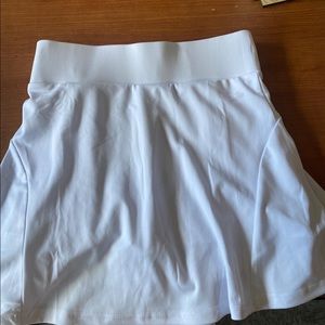 white tennis skirt